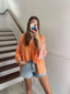 Oversize V-neck coral pink top